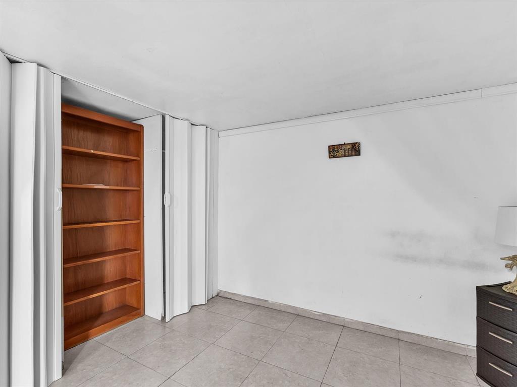 6631 Southwest 24th Street Miramar, FL 33023 - Photo 38 of 42 a view of an empty room with cabinet and utility room