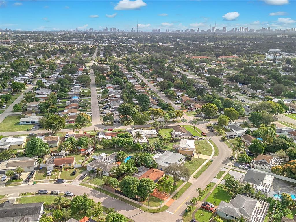6631 Southwest 24th Street Miramar, FL 33023 - Photo 5 of 42 an aerial view of residential houses with city view