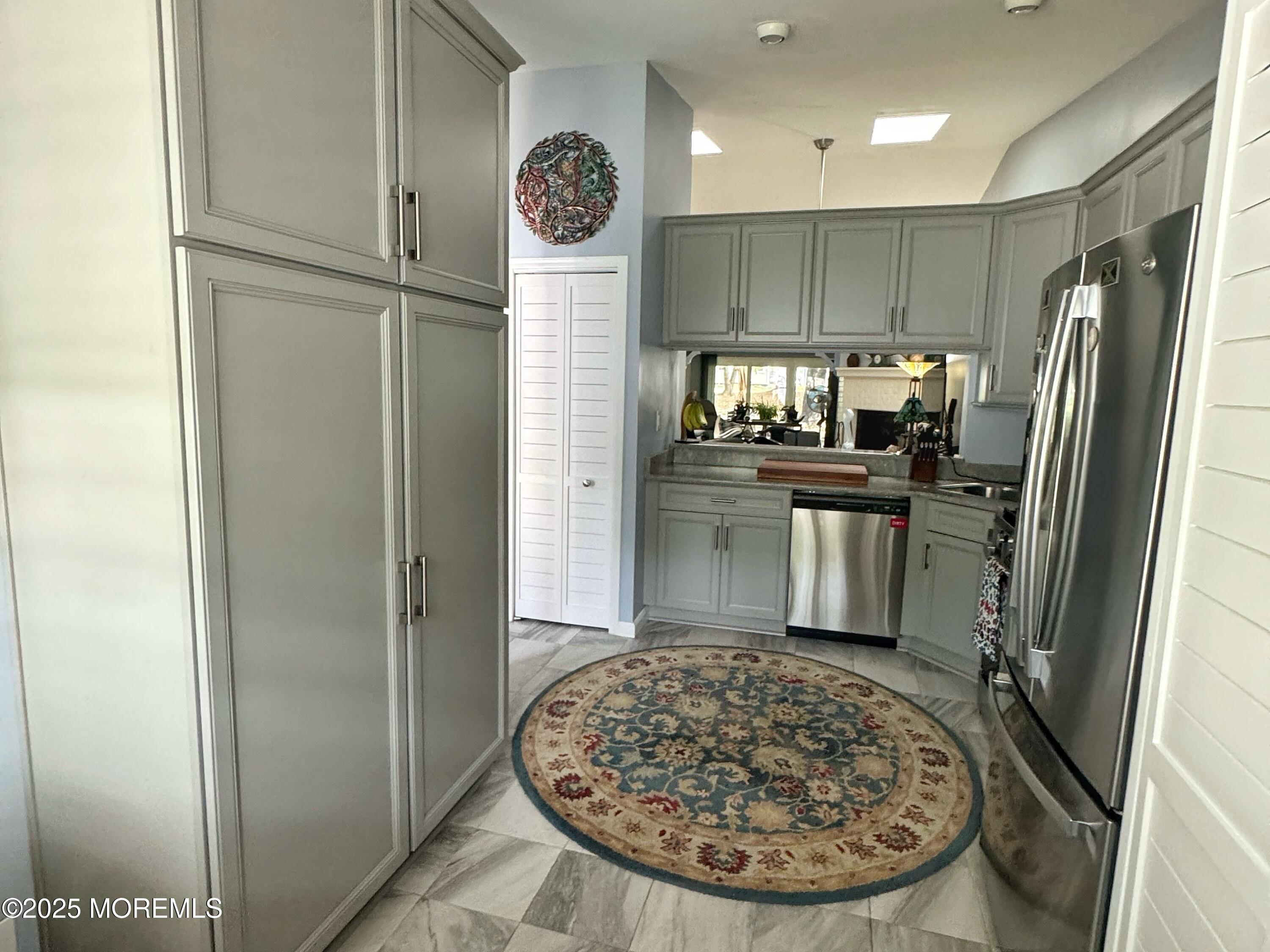 39 Boxwood Terrace Red Bank, NJ 07701 - Photo 12 of 25 a view of a kitchen with refrigerator and windows