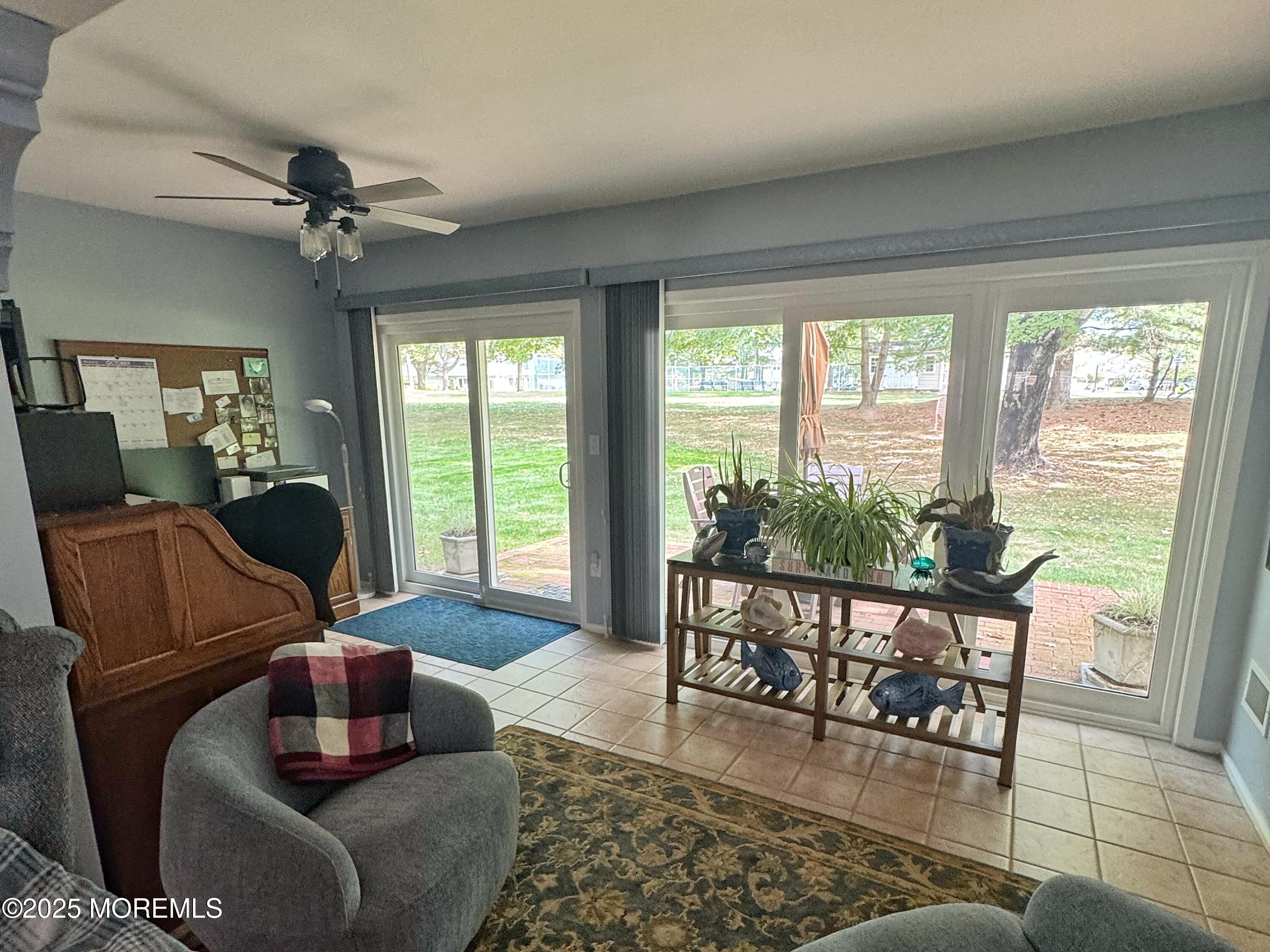 39 Boxwood Terrace Red Bank, NJ 07701 - Photo 8 of 25 a living room with furniture and a large window