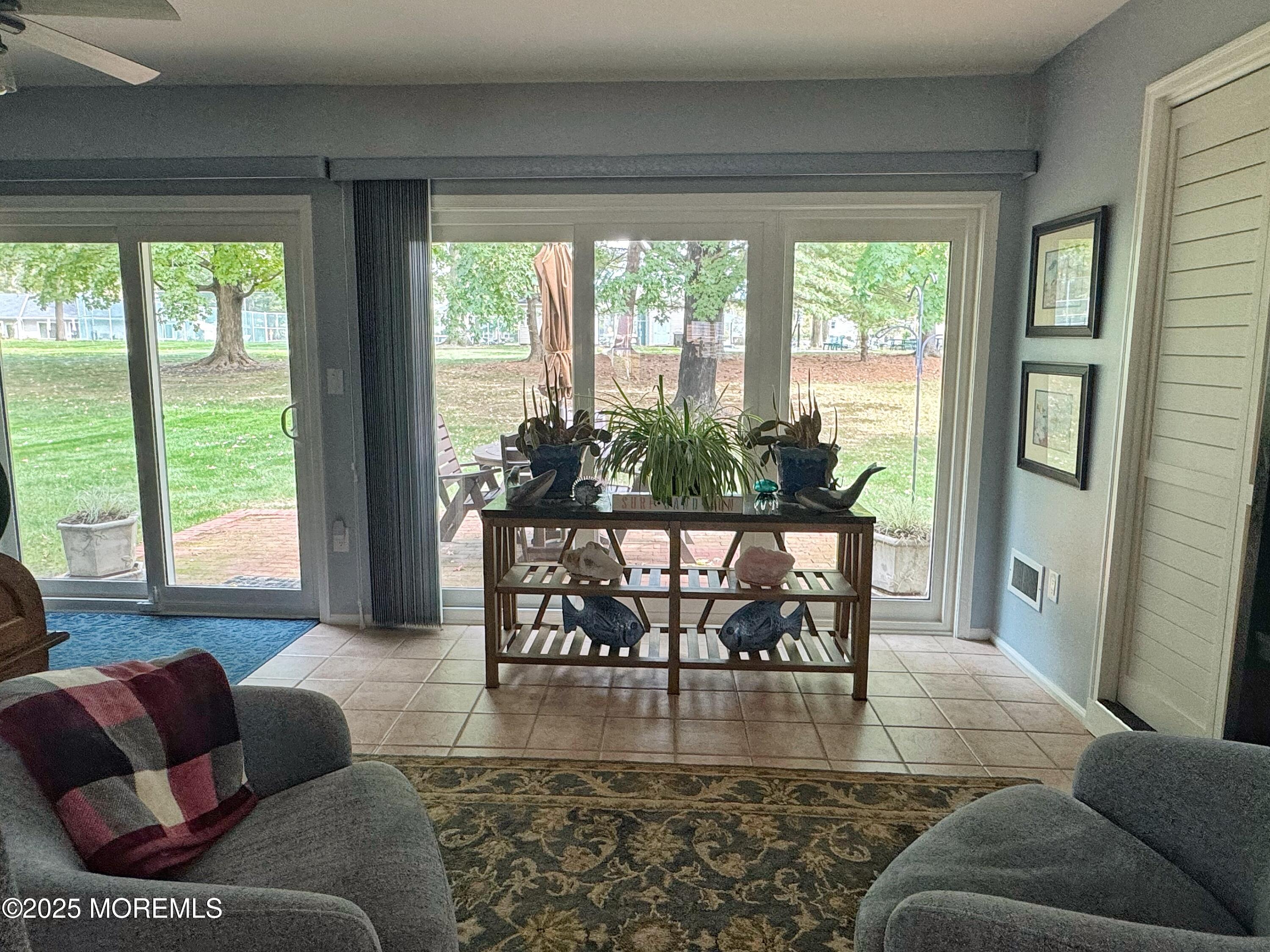 39 Boxwood Terrace Red Bank, NJ 07701 - Photo 9 of 25 a living room with furniture and a large window