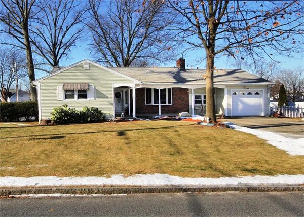 20 Primrose Street Springfield, MA 01151 - Photo 1 of 15 a front view of house with yard and trees around