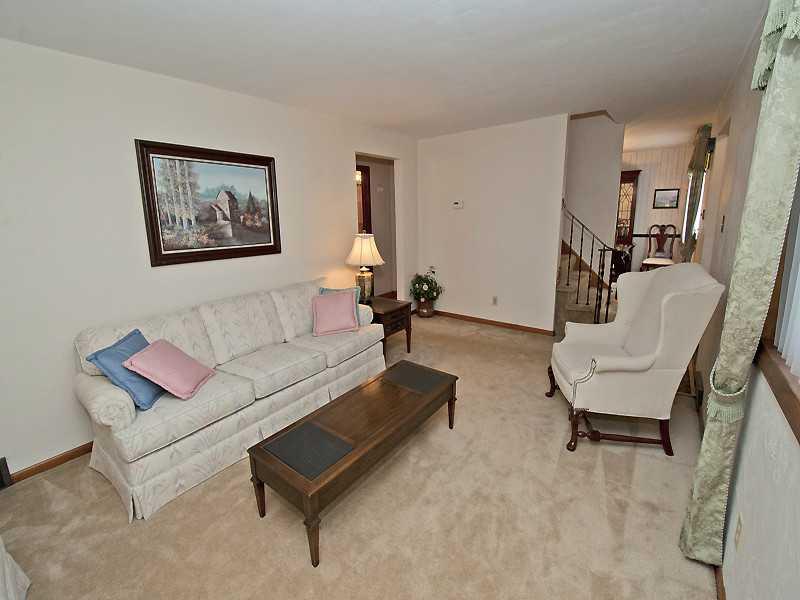 331 Rockfield Road Pittsburgh, PA 15243 - Photo 3 of 12 Living Room. neutral walls and carpet,