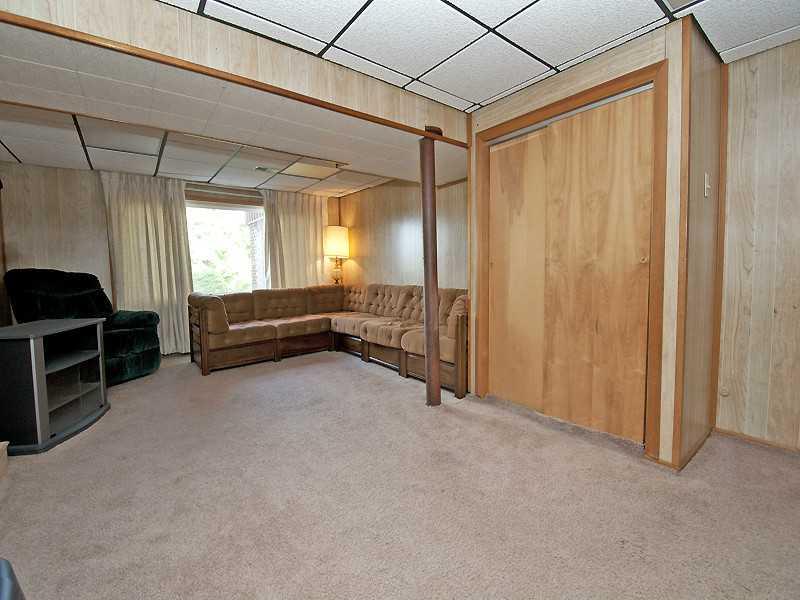 331 Rockfield Road Pittsburgh, PA 15243 - Photo 10 of 12 Den/Family/Great Room. Spacious daylight gameroom, neutral decor. Large enough to fit a pool table or air hockey table