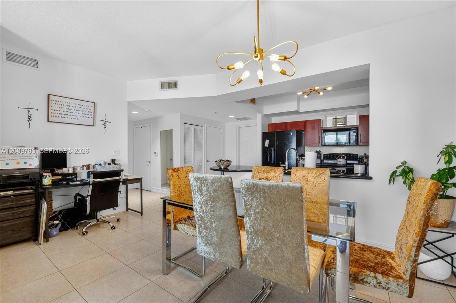 7266 Southwest 88th Street, Unit A403 Miami, FL 33156 - Photo 11 of 32 a view of a dining room and livingroom