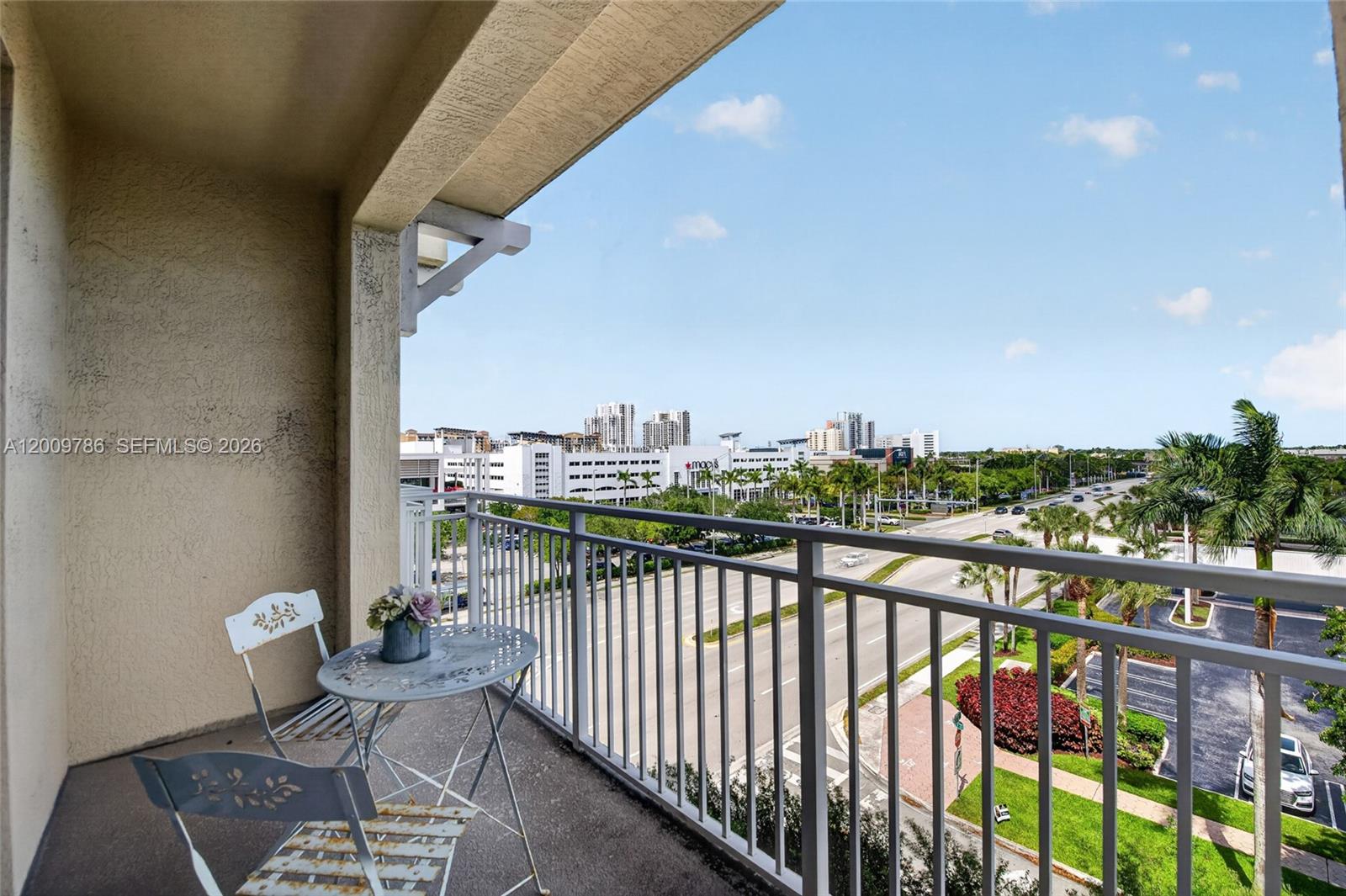 7266 Southwest 88th Street, Unit A403 Miami, FL 33156 - Photo 15 of 32 a view of city from a balcony