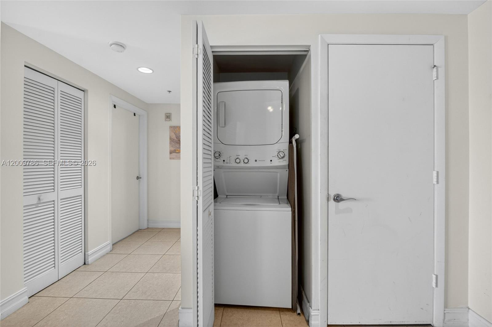 7266 Southwest 88th Street, Unit A403 Miami, FL 33156 - Photo 17 of 32 a view of a storage & utility room