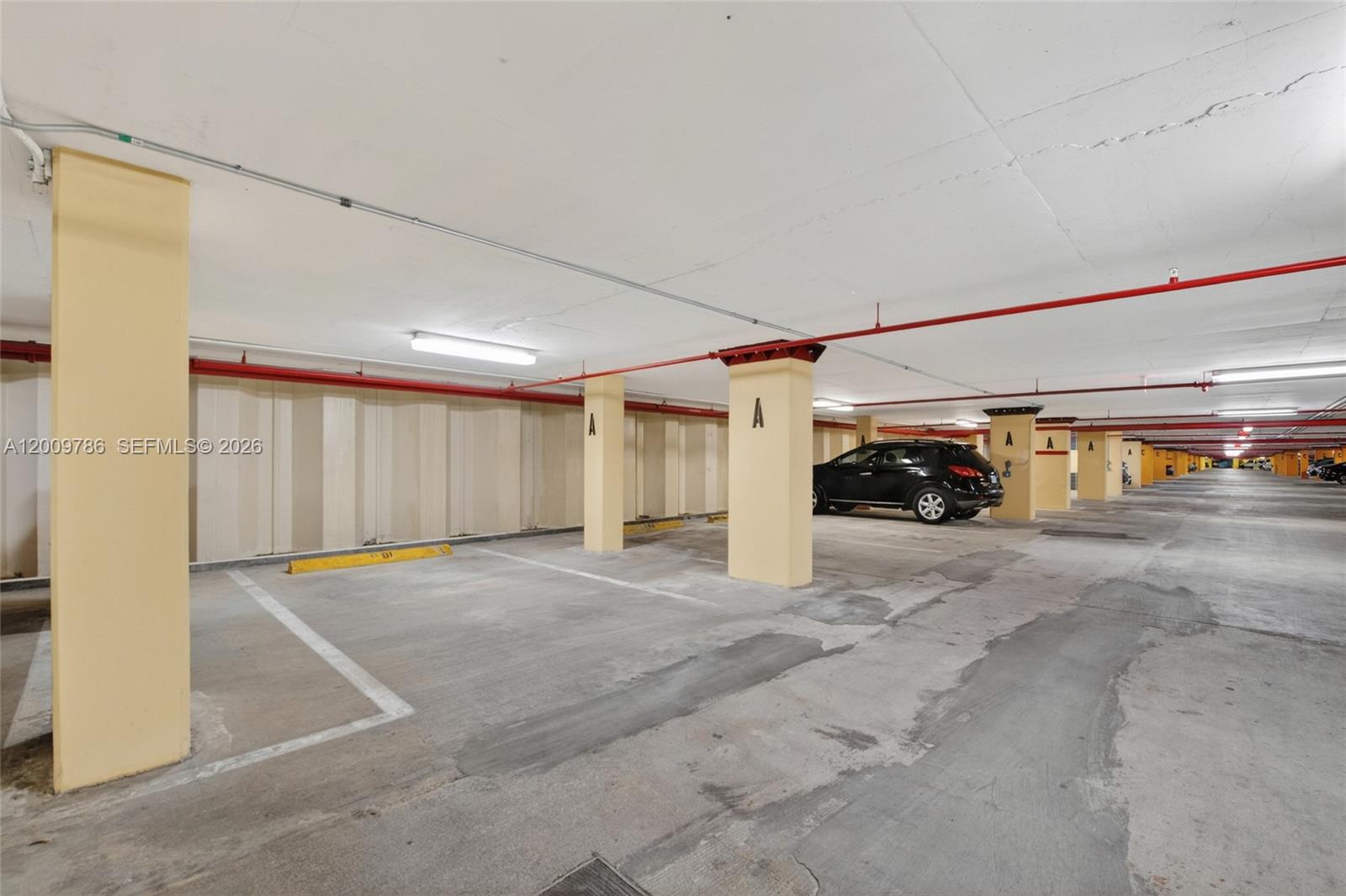 7266 Southwest 88th Street, Unit A403 Miami, FL 33156 - Photo 22 of 32 a view of parking area