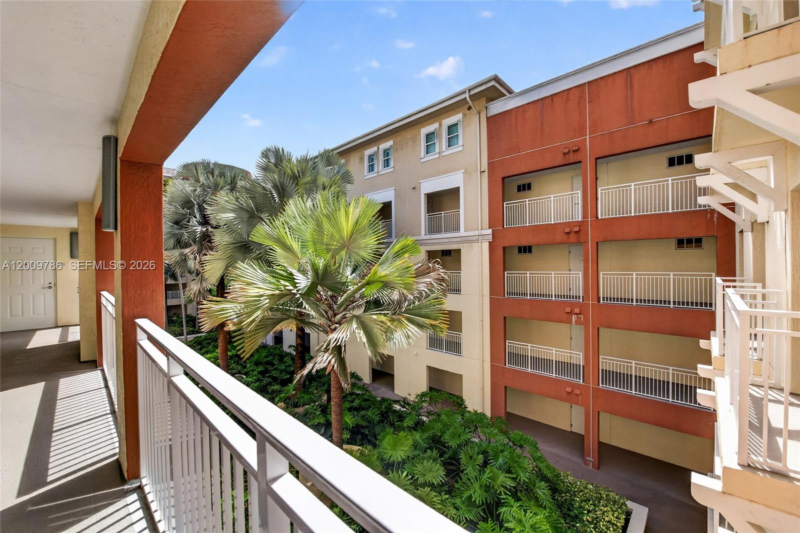 7266 Southwest 88th Street, Unit A403 Miami, FL 33156 - Photo 3 of 32 a view of balcony