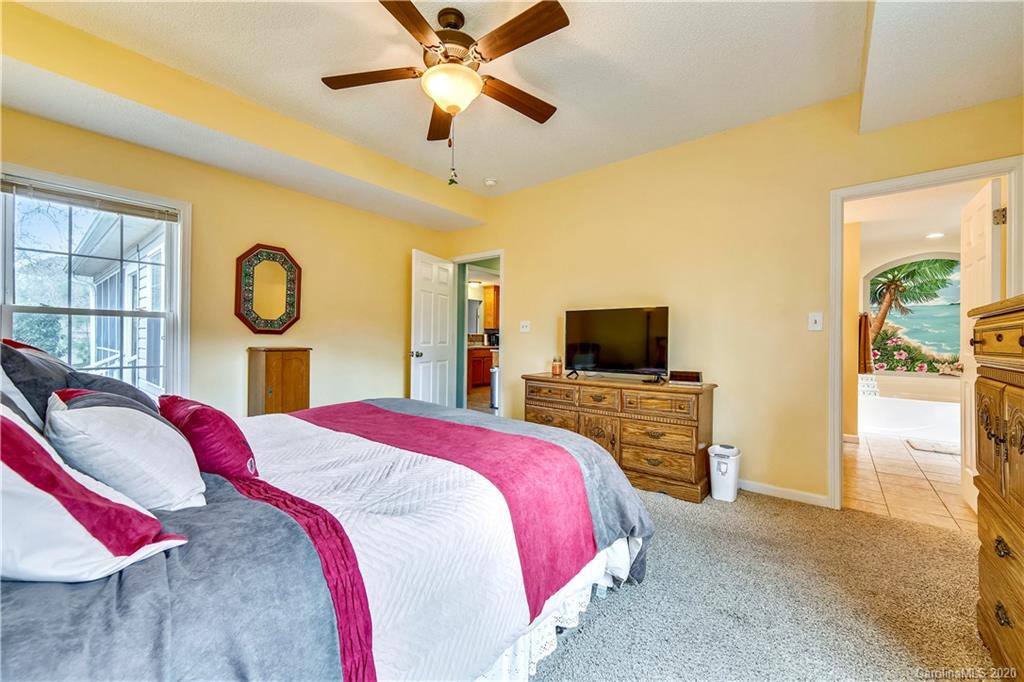 346 Nora Ridge Catawba, SC 29704 - Photo 12 of 29 a bedroom with a bed and a flat screen tv
