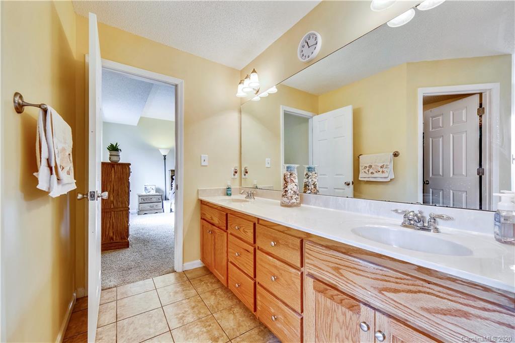 346 Nora Ridge Catawba, SC 29704 - Photo 15 of 29 a bathroom with a double vanity sink mirror and shower