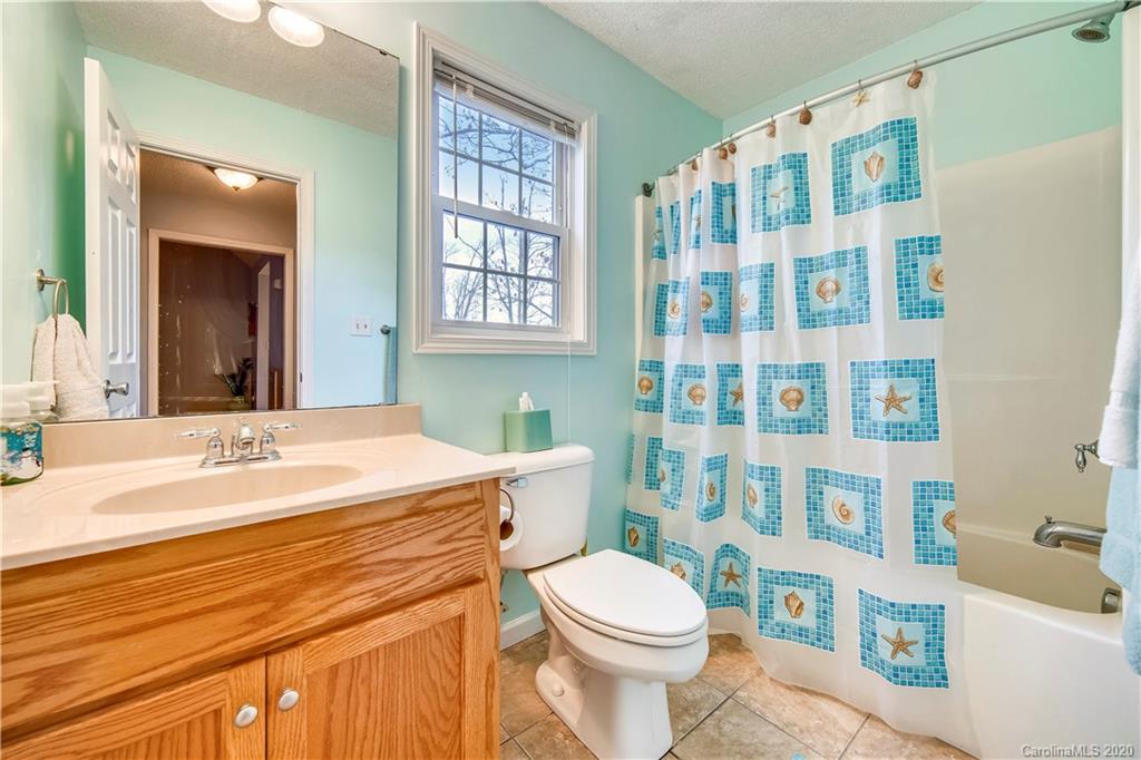 346 Nora Ridge Catawba, SC 29704 - Photo 18 of 29 a bathroom with a sink toilet and shower