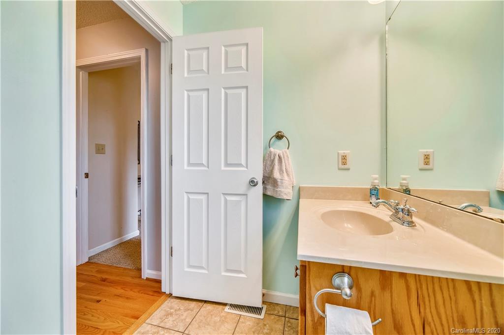 346 Nora Ridge Catawba, SC 29704 - Photo 19 of 29 a bathroom with a sink and a mirror