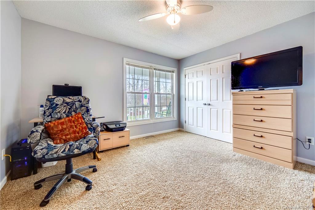 346 Nora Ridge Catawba, SC 29704 - Photo 20 of 29 a bedroom with furniture and a flat screen tv