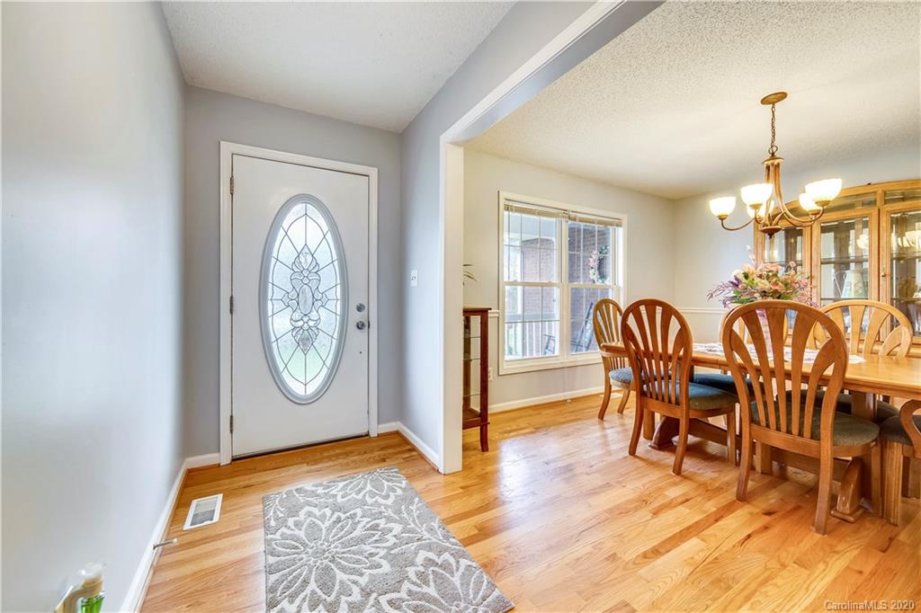 346 Nora Ridge Catawba, SC 29704 - Photo 3 of 29 a view of a dining room with furniture and wooden floor