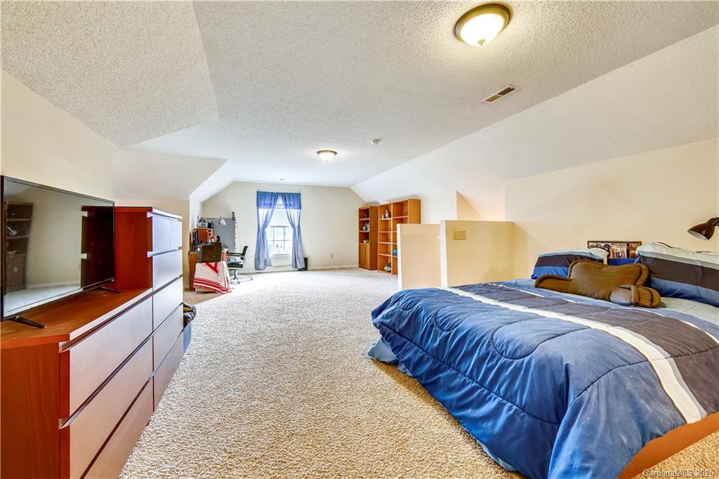 346 Nora Ridge Catawba, SC 29704 - Photo 23 of 29 a bed room with a bed and a television
