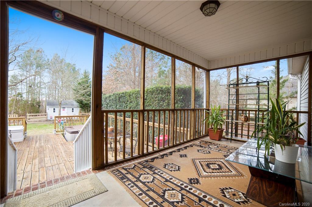 346 Nora Ridge Catawba, SC 29704 - Photo 25 of 29 a view of a living room and a floor to ceiling window or wooden floor