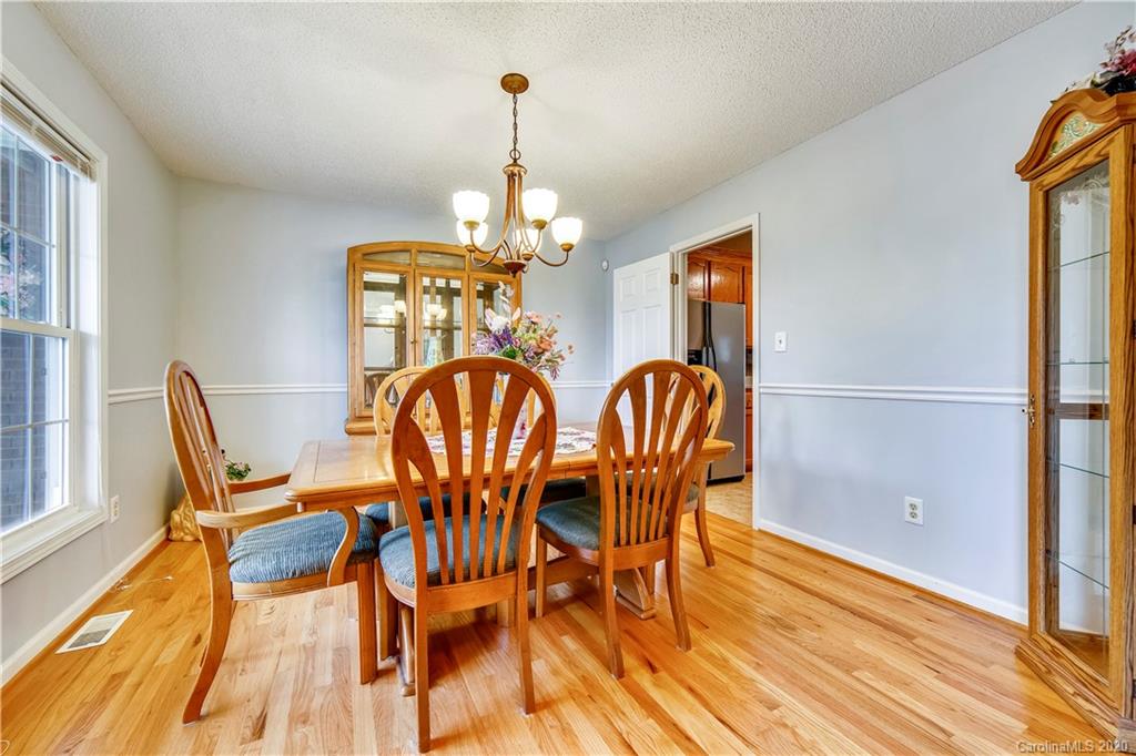 346 Nora Ridge Catawba, SC 29704 - Photo 4 of 29 a view of a dining room with furniture and wooden floor