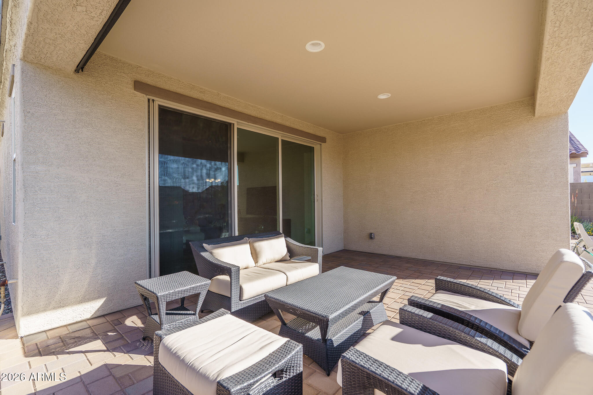 18127 West Fairview Street Goodyear, AZ 85338 - Photo 15 of 48 a balcony with a table and chairs
