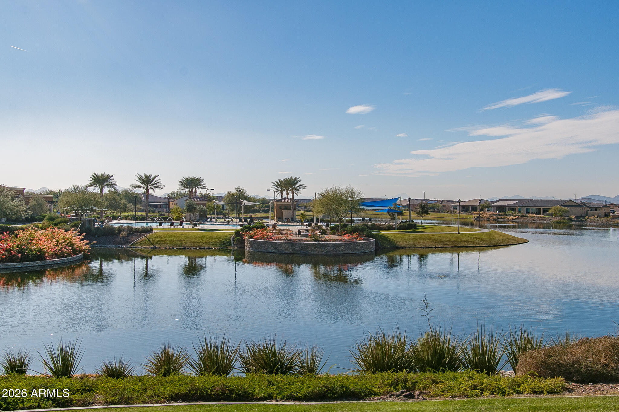 18127 West Fairview Street Goodyear, AZ 85338 - Photo 40 of 48 a view of a lake with houses