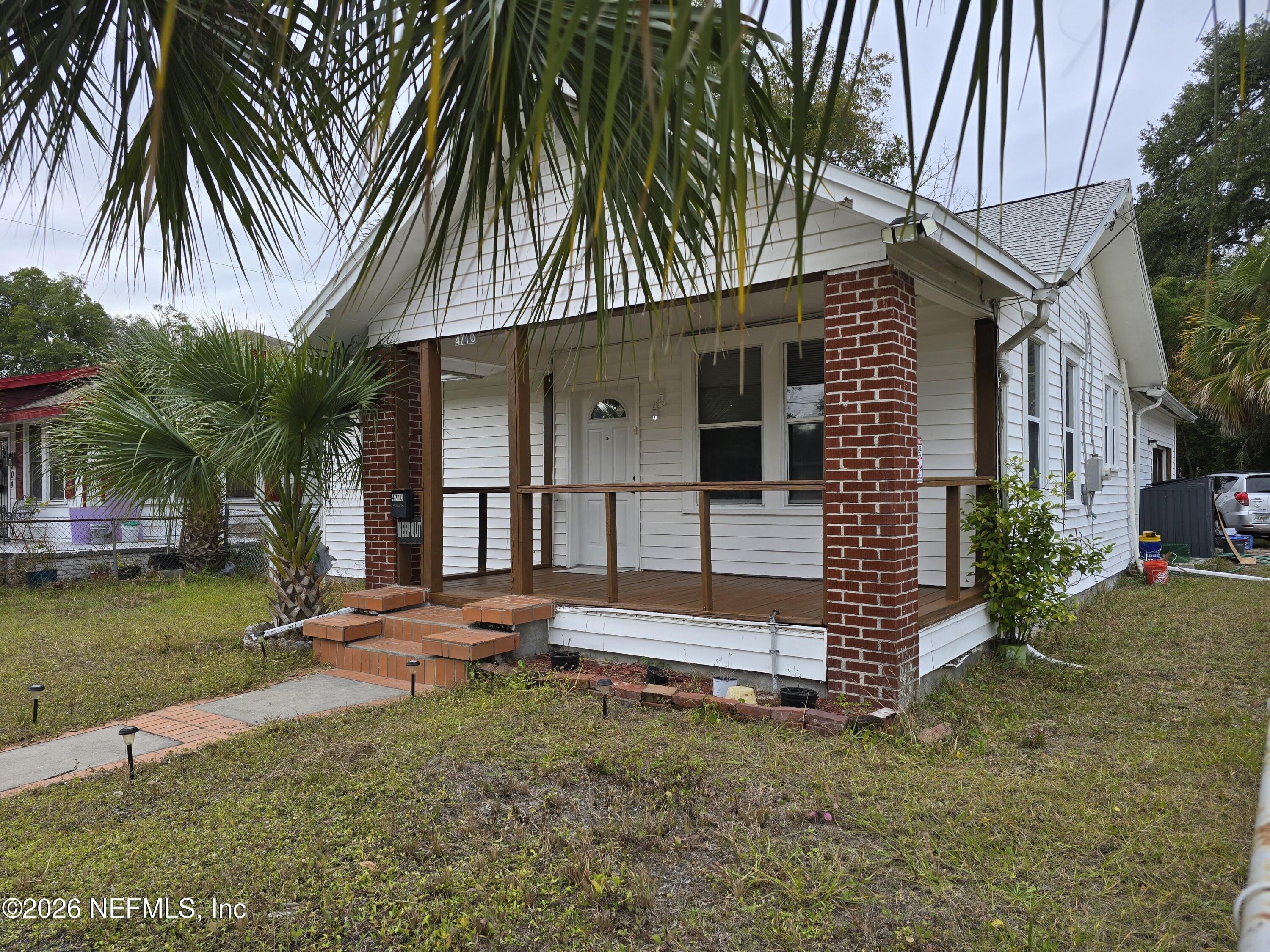 4710 Springfield Boulevard Jacksonville, FL 32206 - Photo 2 of 28 front view of a house with a yard