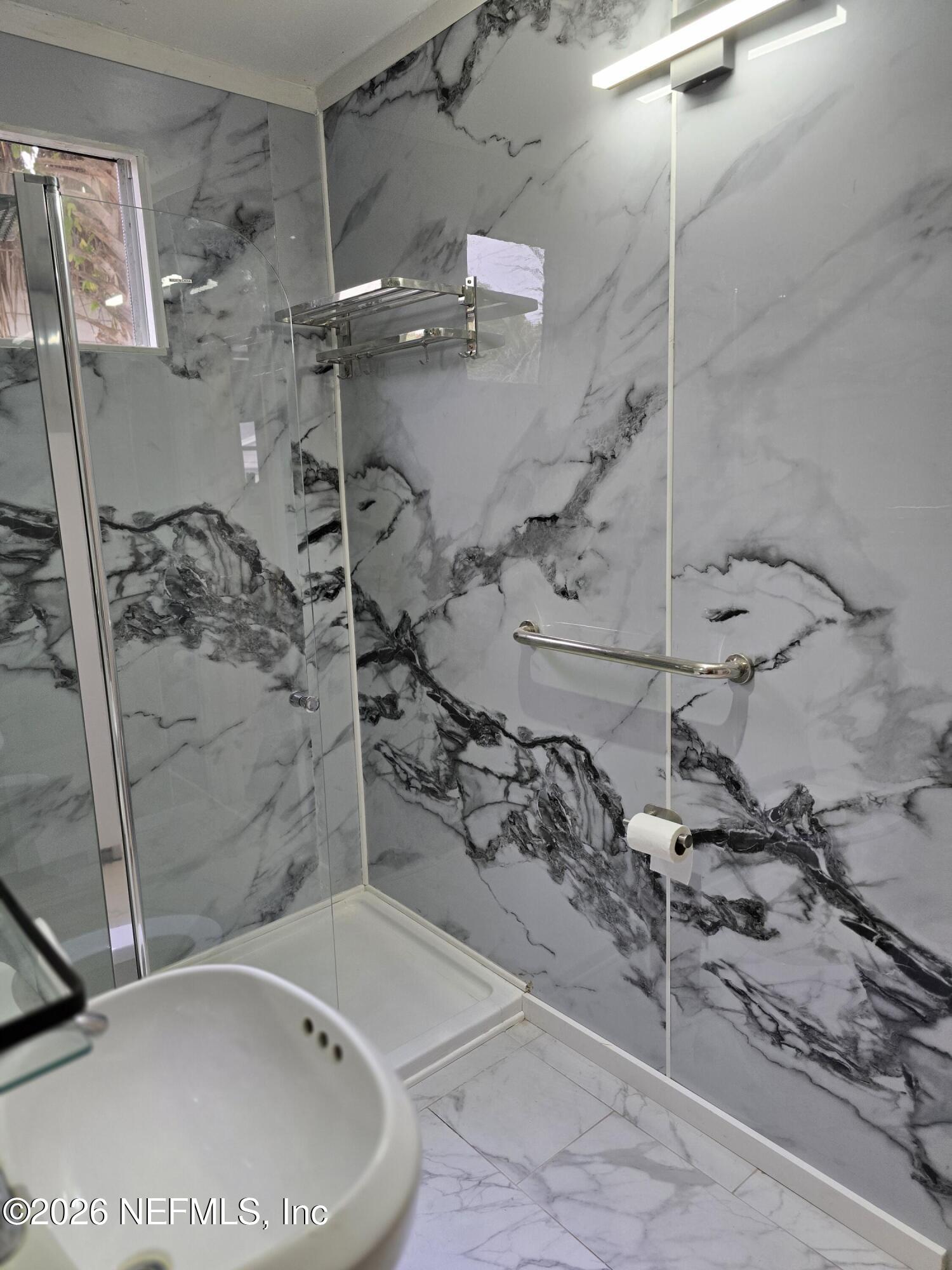 4710 Springfield Boulevard Jacksonville, FL 32206 - Photo 22 of 28 a bathroom with a shower