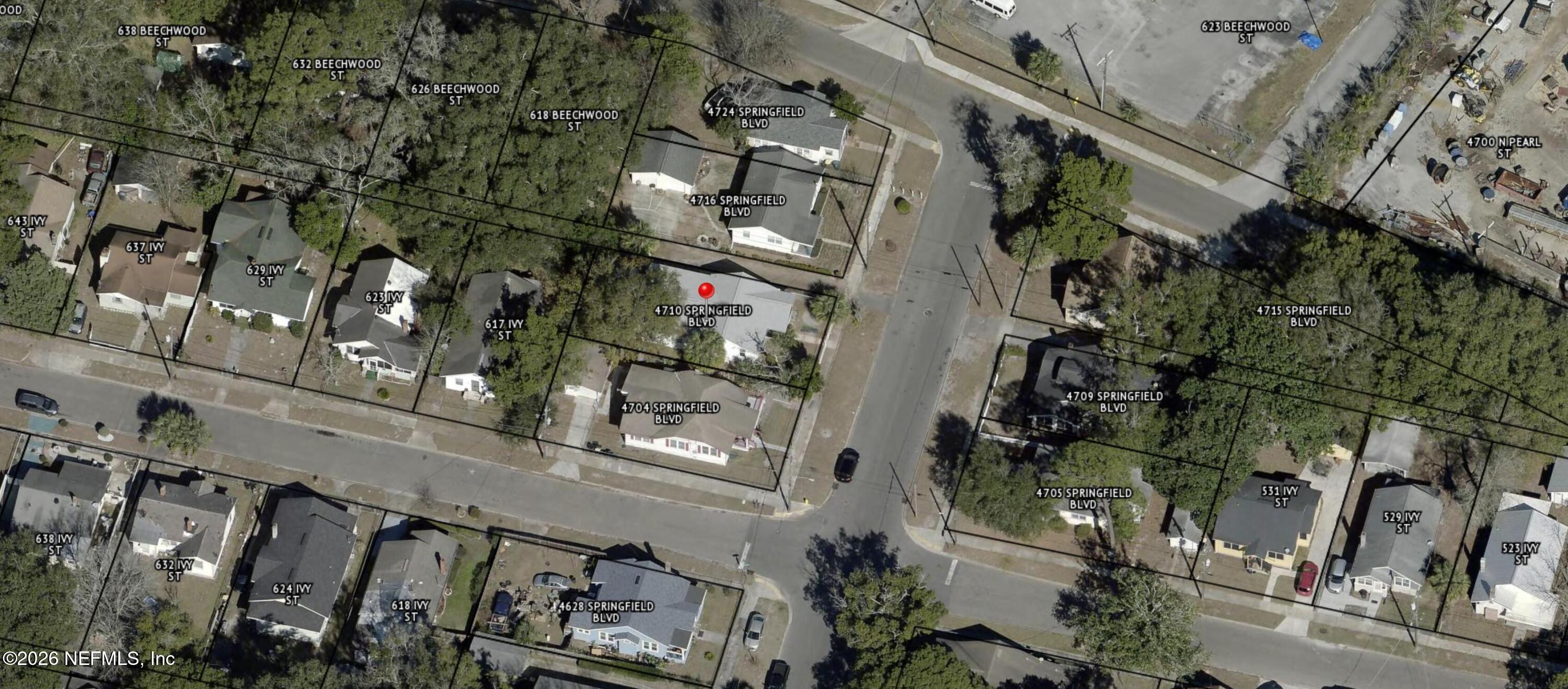 4710 Springfield Boulevard Jacksonville, FL 32206 - Photo 25 of 28 an aerial view of a residential apartment building with a yard and potted plants