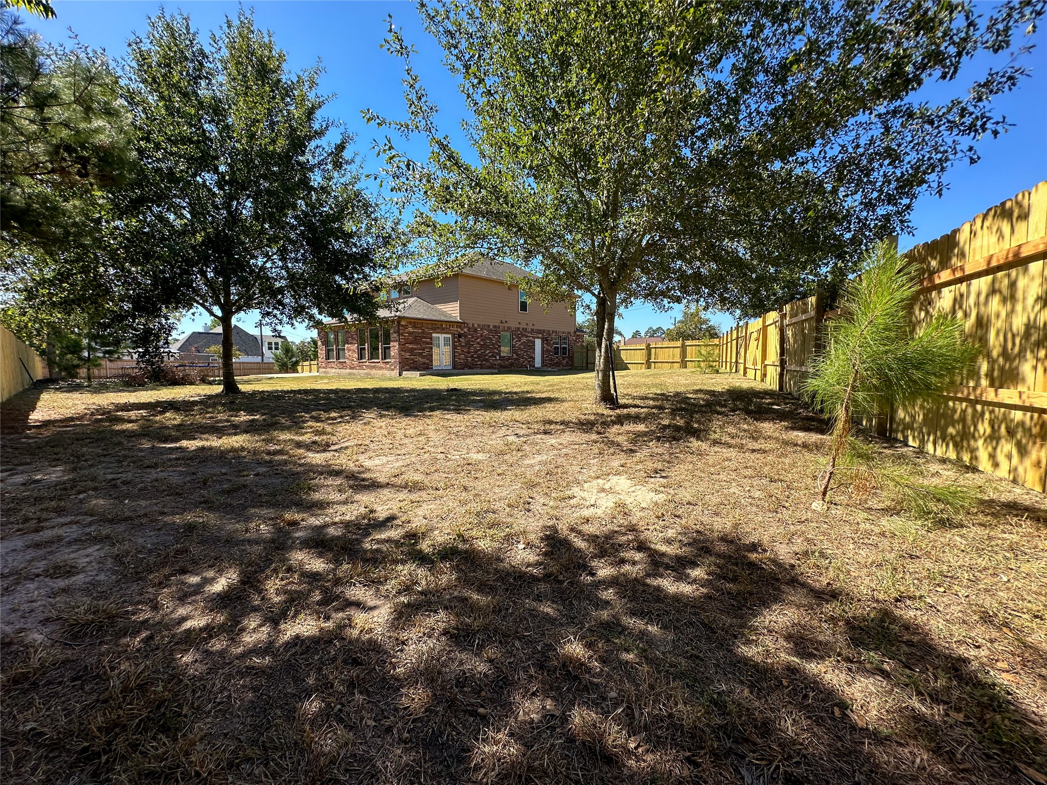 237 Cardinal Drive Paige, TX 78659 - Photo 31 of 37 View of fenced backyard