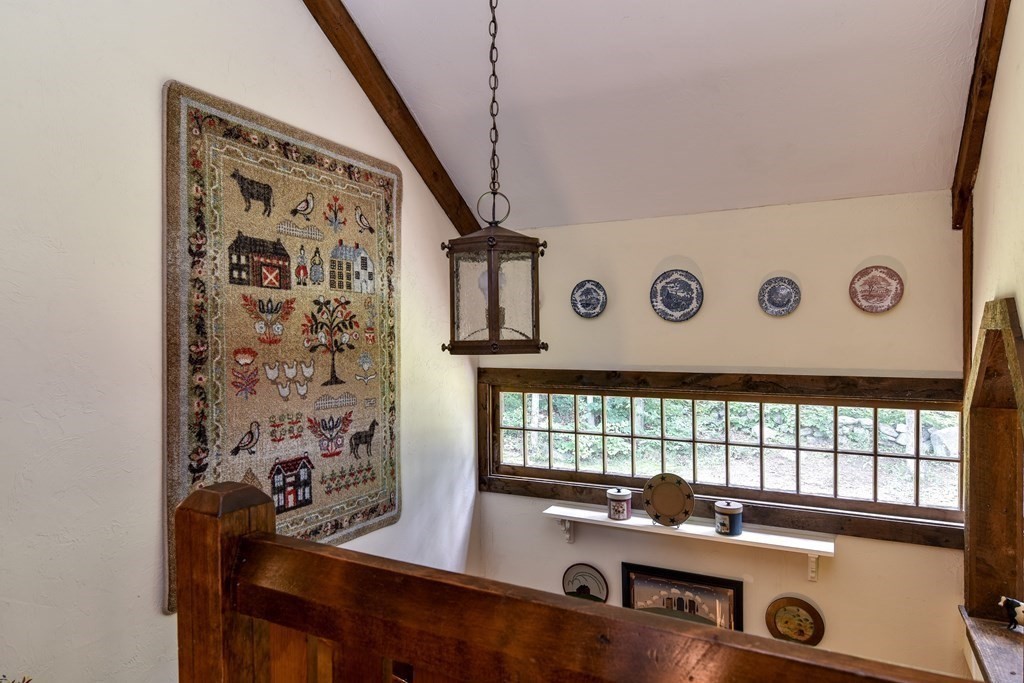 26 Woobly Road Bolton, MA 01740 - Photo 20 of 38 a room with a window and a table