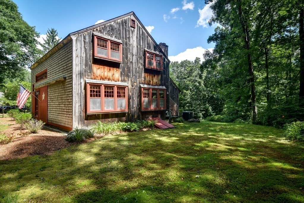 26 Woobly Road Bolton, MA 01740 - Photo 33 of 38 a view of a house with a yard