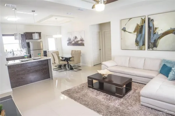 a living room with furniture and a couch