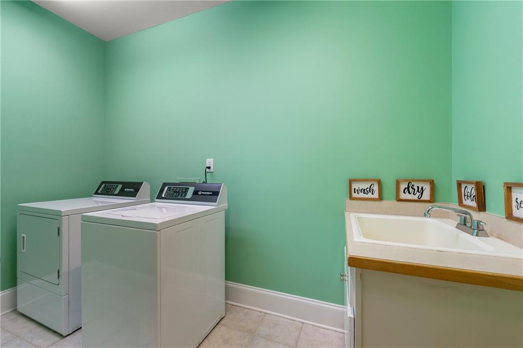 244 Dodgen Road Hampton, GA 30228 - Photo 23 of 55 a utility room with dryer and washer