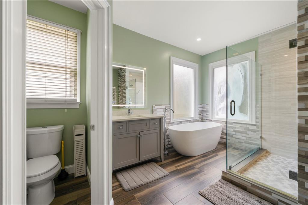 244 Dodgen Road Hampton, GA 30228 - Photo 26 of 55 a bathroom with a toilet sink and mirror