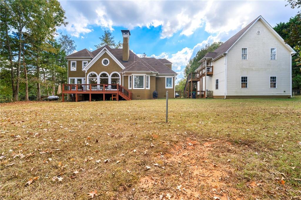 244 Dodgen Road Hampton, GA 30228 - Photo 55 of 55 a front view of a house with a yard