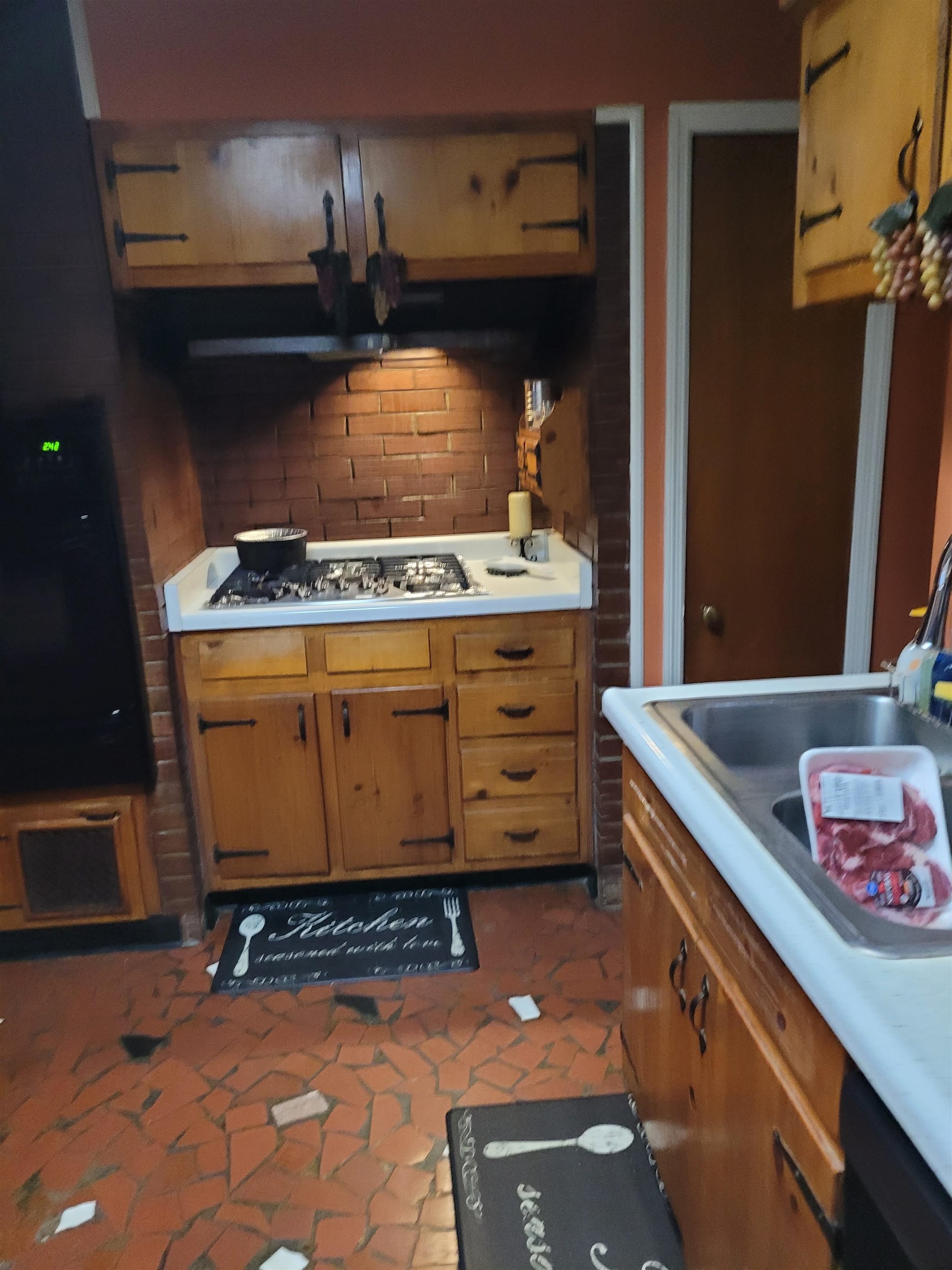 1558 Patterson Street Memphis, TN 38111 - Photo 6 of 11 a stove top oven sitting inside of a kitchen