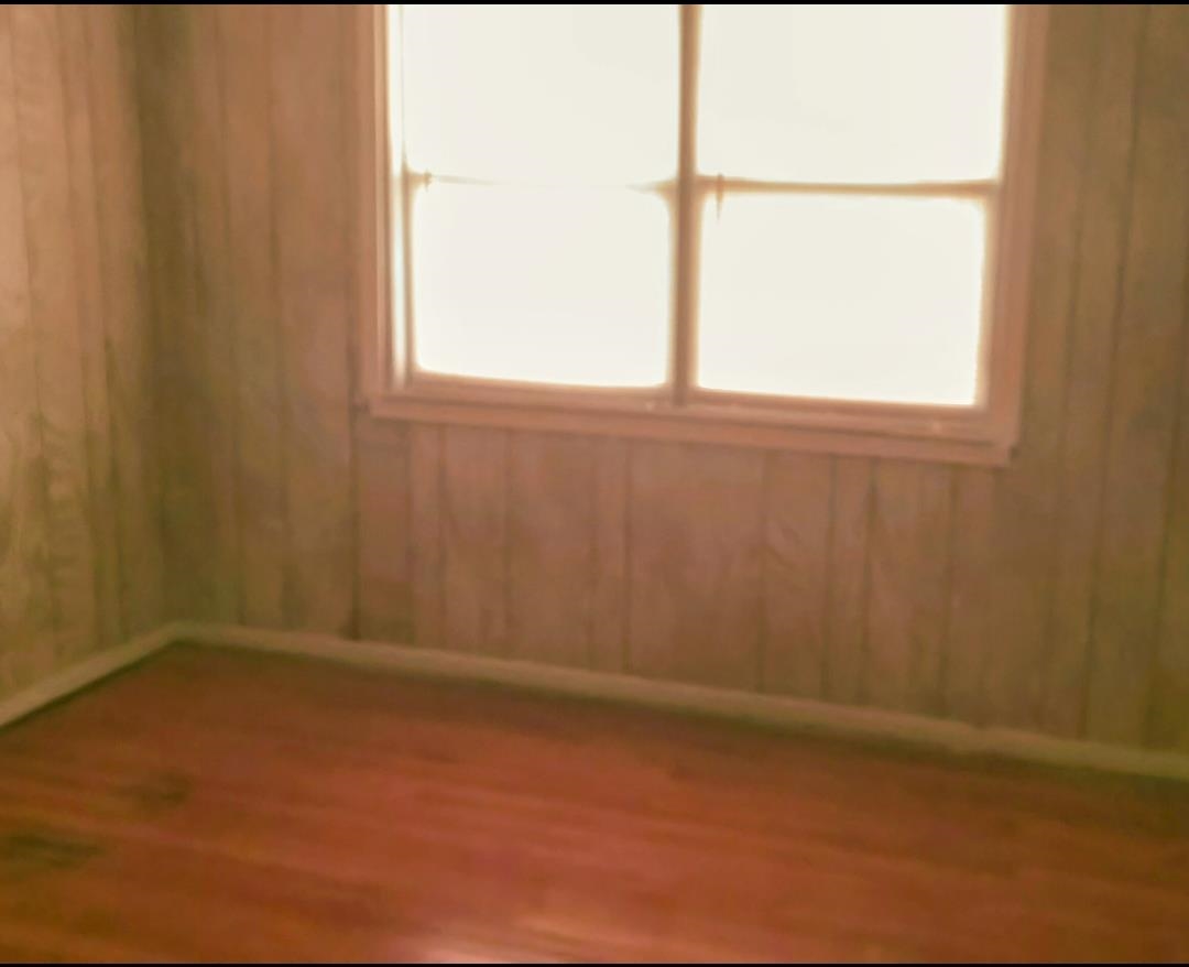 1558 Patterson Street Memphis, TN 38111 - Photo 7 of 11 an empty room with a window