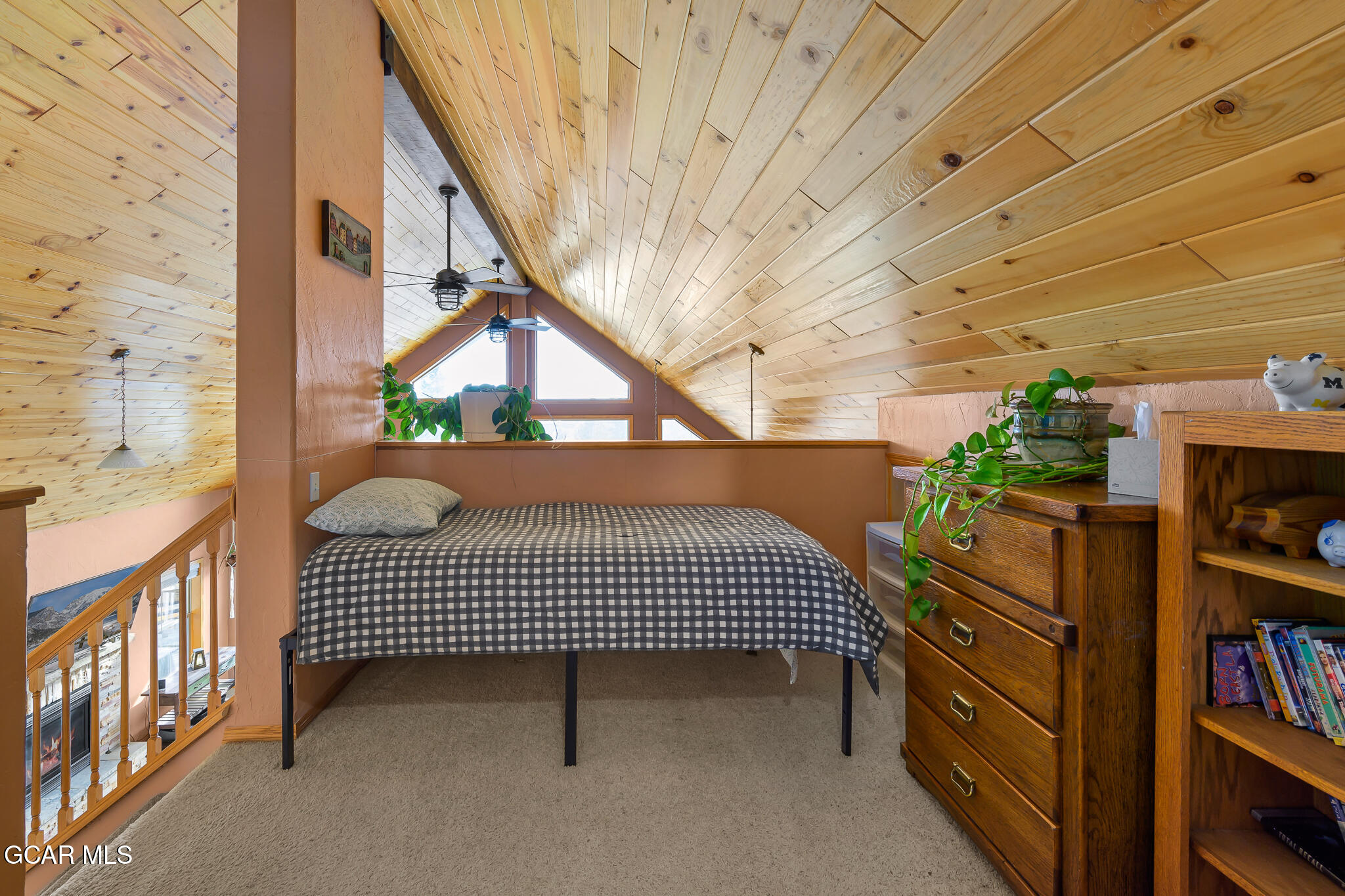 300 County Road Grand Lake, CO 80447 - Photo 25 of 47 a view of a staircase with lots of stuff and plants