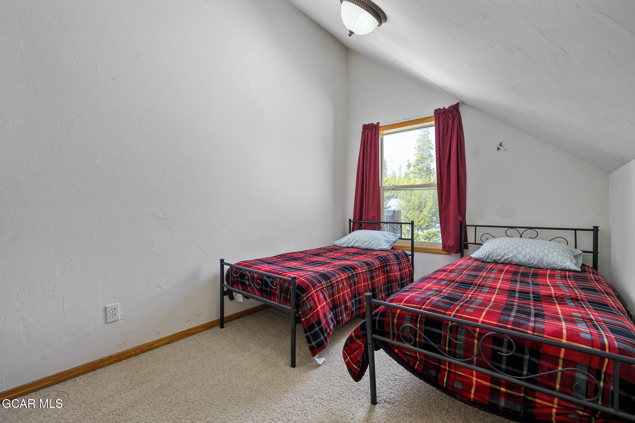 300 County Road Grand Lake, CO 80447 - Photo 30 of 47 a bedroom with two beds and window