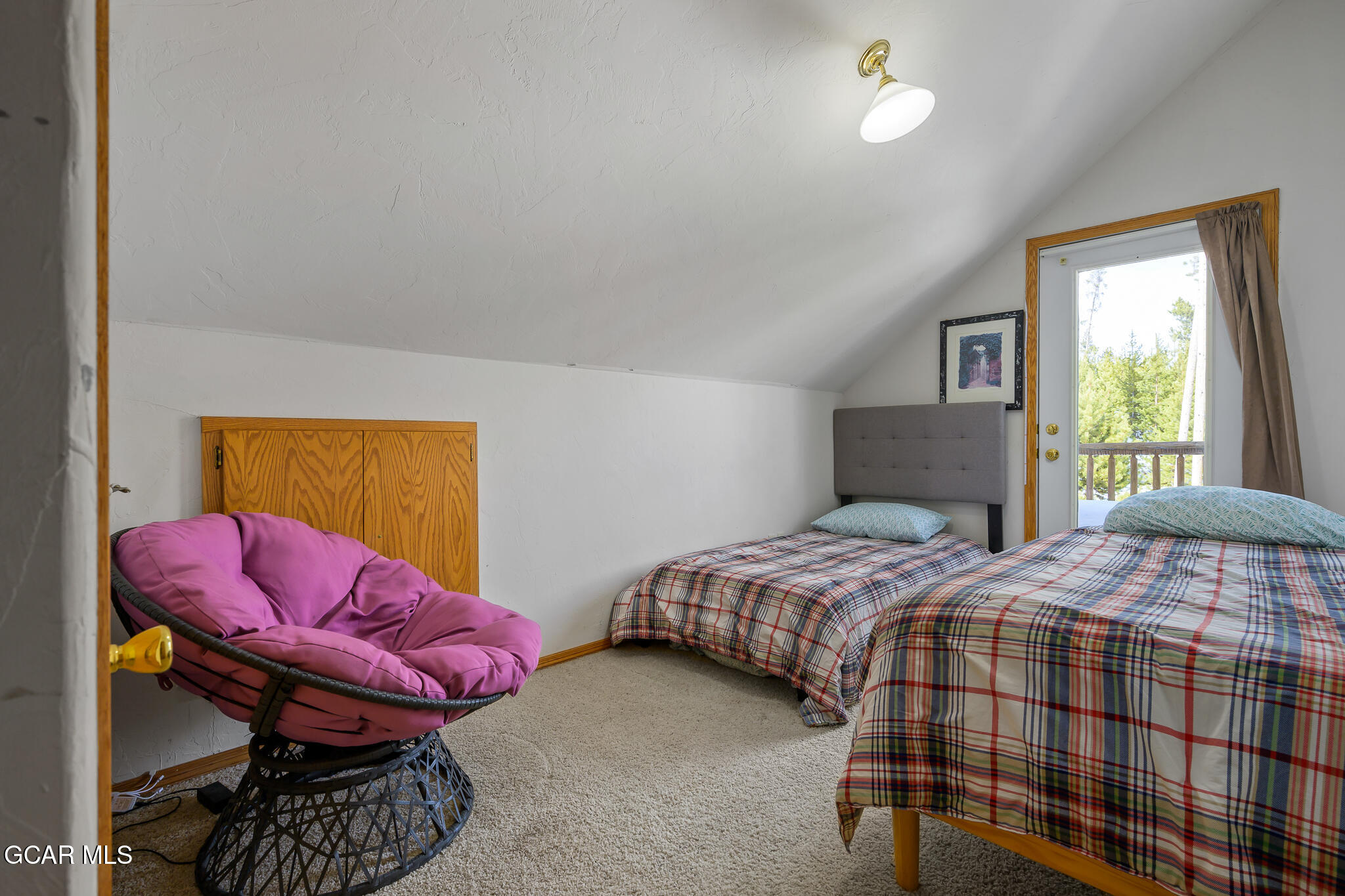 300 County Road Grand Lake, CO 80447 - Photo 31 of 47 a bedroom with a bed and a window