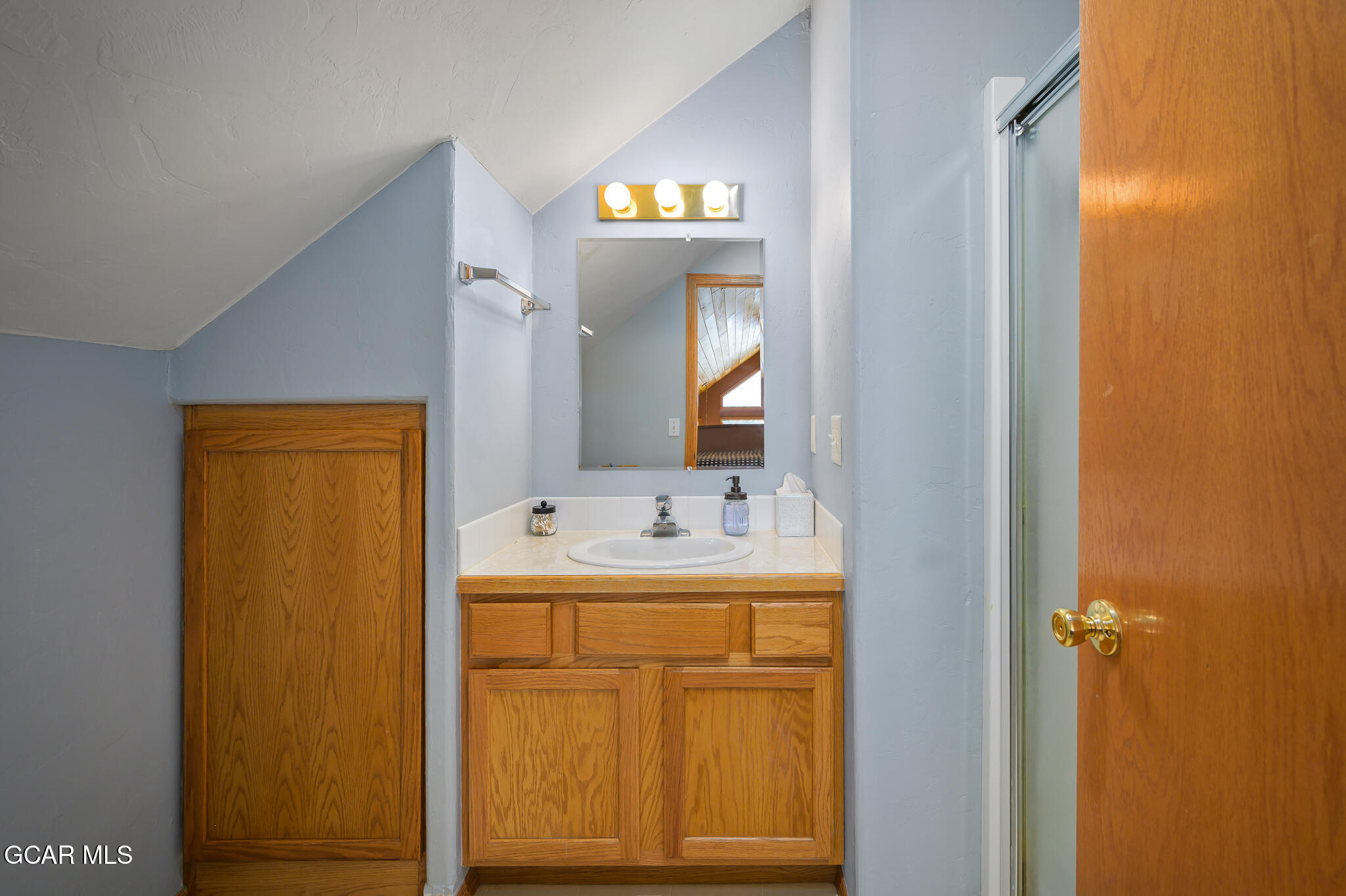 300 County Road Grand Lake, CO 80447 - Photo 33 of 47 a bathroom with a sink and a mirror