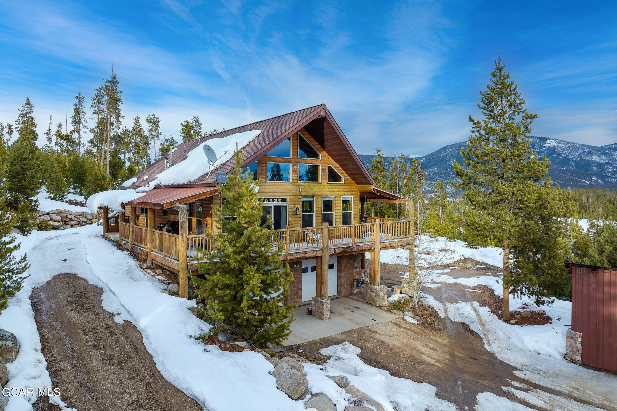 300 County Road Grand Lake, CO 80447 - Photo 41 of 47 a front view of a house with a yard