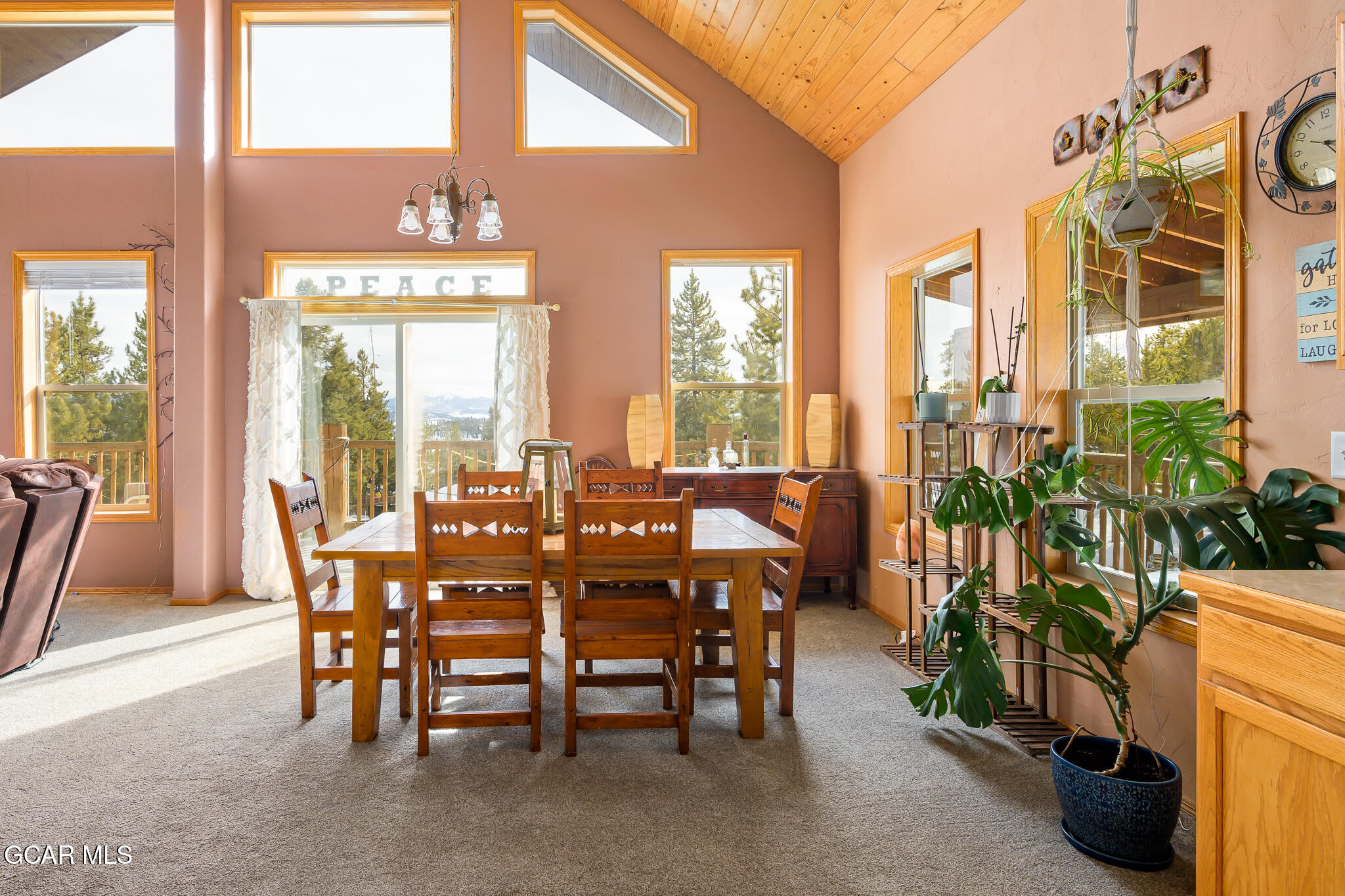 300 County Road Grand Lake, CO 80447 - Photo 10 of 47 a view of a dining room with furniture window and outside view