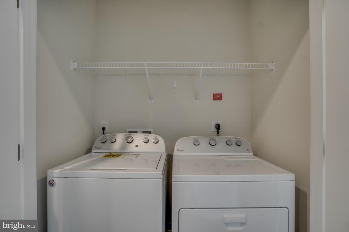 19958 Abram Terrace Ashburn, VA 20147 - Photo 16 of 41 a utility room with dryer and washer