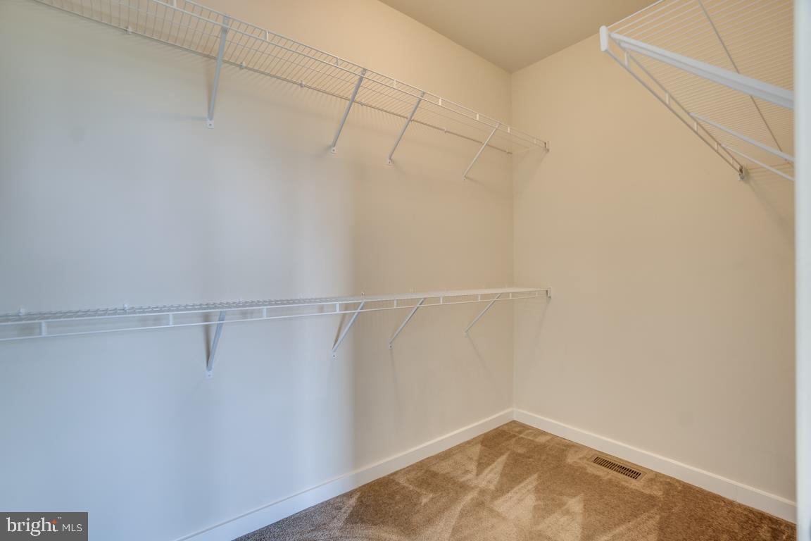 19958 Abram Terrace Ashburn, VA 20147 - Photo 21 of 41 a view of a room with racks on the wall