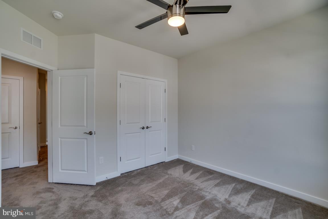 19958 Abram Terrace Ashburn, VA 20147 - Photo 26 of 41 a view of a livingroom with a hallway