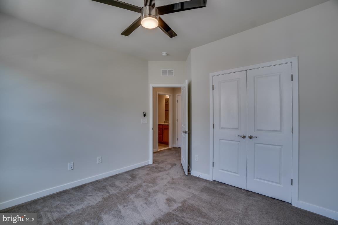 19958 Abram Terrace Ashburn, VA 20147 - Photo 27 of 41 an empty room with closet area