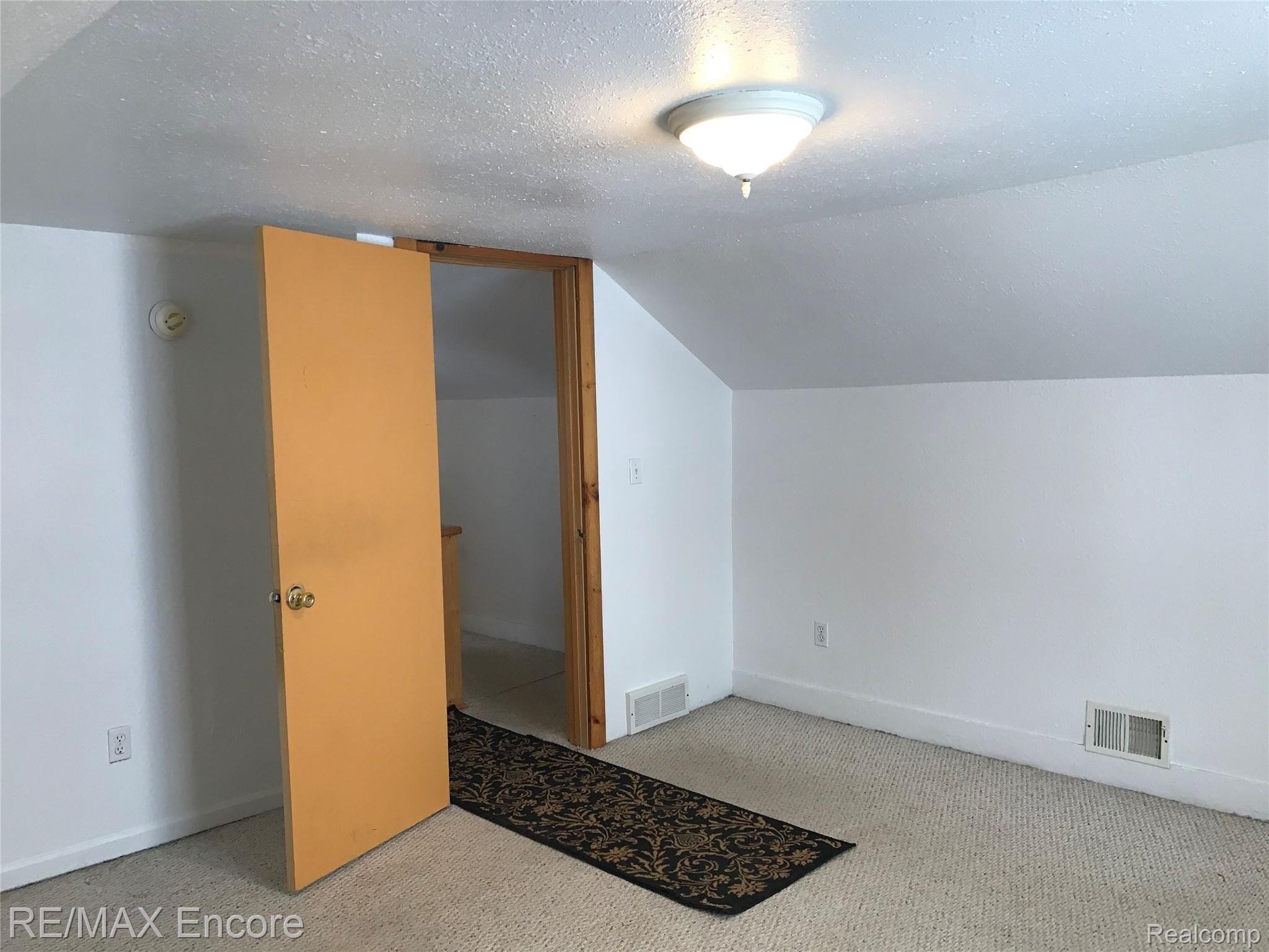 7352 Peet Road Chesaning, MI 48616 - Photo 32 of 50 Bedroom 3 continued. Upper level.