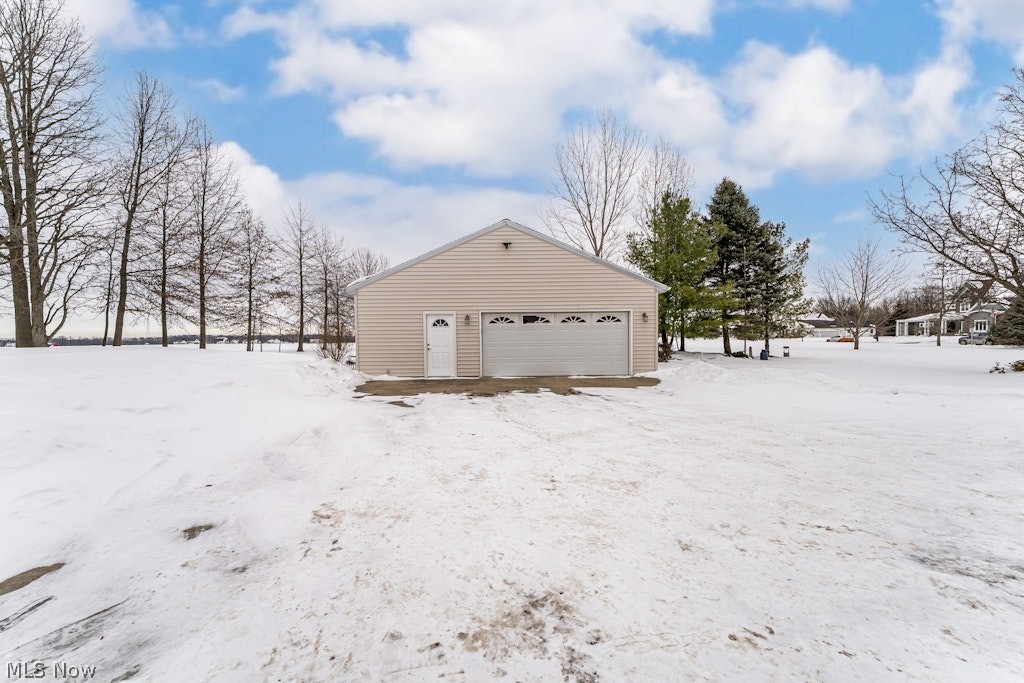 41341 Ravines Edge Way Lagrange, OH 44050 - Photo 3 of 50 This 24x32 detached garage is extra deep for plenty of additional lawn equipment & storage even with 2 more vehicle spaces. Includes a garage door opener too