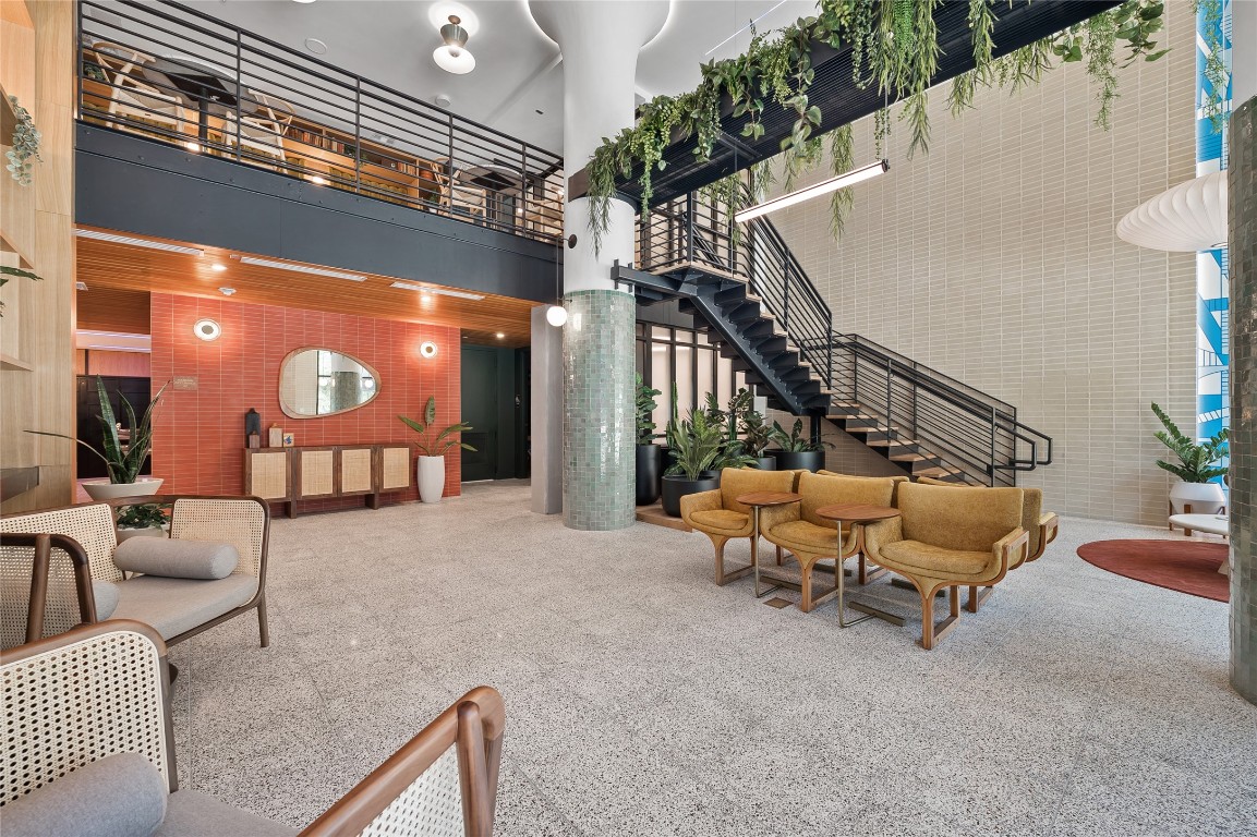 1701 Simond Avenue, Unit 605 Austin, TX 78723 - Photo 1 of 19 a view of a patio with couches and a fire pit
