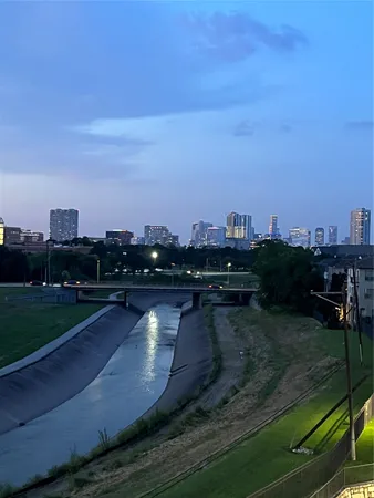 a view of a lake with a city